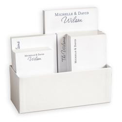 Personalized couples pad set presented in a white or engraved stainless steel holder, with the choice of seven ink colors
