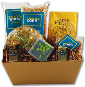 Gift basket arrangement filled with sweet and salty snacks with a portion of the proceeds going to hunger relief