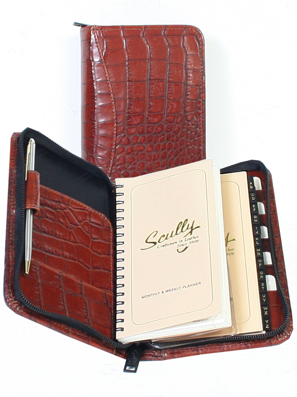 LEATHER ZIP POCKET PLANNER. INSIDE POCKET. 3.75 INCH X 6.75 INCH WEEKLY