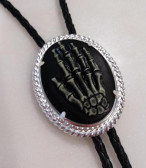 CABOCHON BLACK RESIN WITH RAISED WHITE SKELETON HAND BOLO TIE