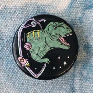 T-Rex Dinosaur in Space - Black Hole Button Pin Holographic Flair - Wildflower Co