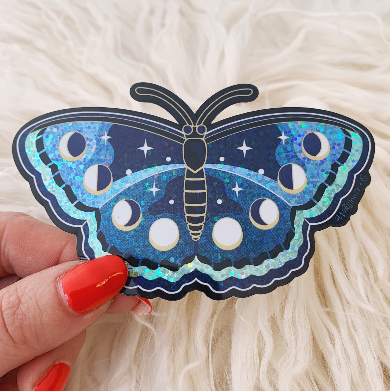 https://cdn10.bigcommerce.com/s-3foajvlh/products/1657/images/7451/Lunar_Butterfly_Sticker_-_Glitter_Holographic_Vinyl_Stickers_-_Lunar_Moth_-_Night_Butterfly_-_Moon_Phases_-_Wildflower_Co_8__36165.1585414552.1280.1280.JPG?c=2