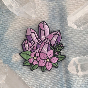 We're seeing crystal visions with these cute crystal iron on patches with floral accents. Wildflower + Co. DIY patches. 

♥ Lilac - represents amethyst with lilac accents
