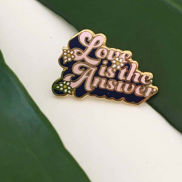 Love is the Answer 70's Inspired Enamel Pin - Gold - VSCO - Wildflower + Co.
………………………………….………………………………….……………………..
Love is the Answer...'nuff said. Hard enamel pin is 70's inspired & reminds us all of the key to life! Wildflower + Co. DIY.
