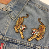 Savage, climbing tiger patches are perfect for bad asses. Intricately embroidered. We designed these as a pair - mirror images of each other. They are sized to look awesome on the yoke of a jacket (& just about anywhere!).

♥ Right side only
