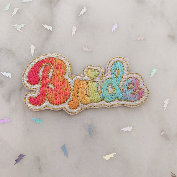 TR00465-MLT-OS LGBTQ Lesbian Rainbow Bride Patch - Gay Pride - Iron On, Iron-On, Patch, Patches, Patches for Jackets, Embroidered, Pride, Bachlerotte, Wedding, Bride, Honeymoon, Bridal, Bridal Shower, Rainbow, Gradient, Love, Pride, Pride Month, LGBTQ, LGBT, LGBT+, Gay, Gay Pride, Lesbian Pride, Bisexual, Pansexual, Love, Love is Love, Colorful, WLW, MLM, Queer Wildflower + Co 