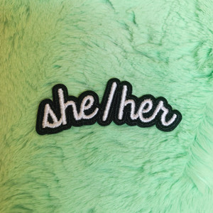 TR00479-BLK-OS - she / her Pronoun Patch - Patches, Patch, Iron On, Iron On Patches, Patches for Jackets, Embroidered Patches, Embroidery, Embroidered, Pronouns, Pronouns Patch, They/Them, Nonbinary, Trans, Gender Neutral, Preference, Preferred, Preferred Pronouns, LGBTQ+, Inclusive