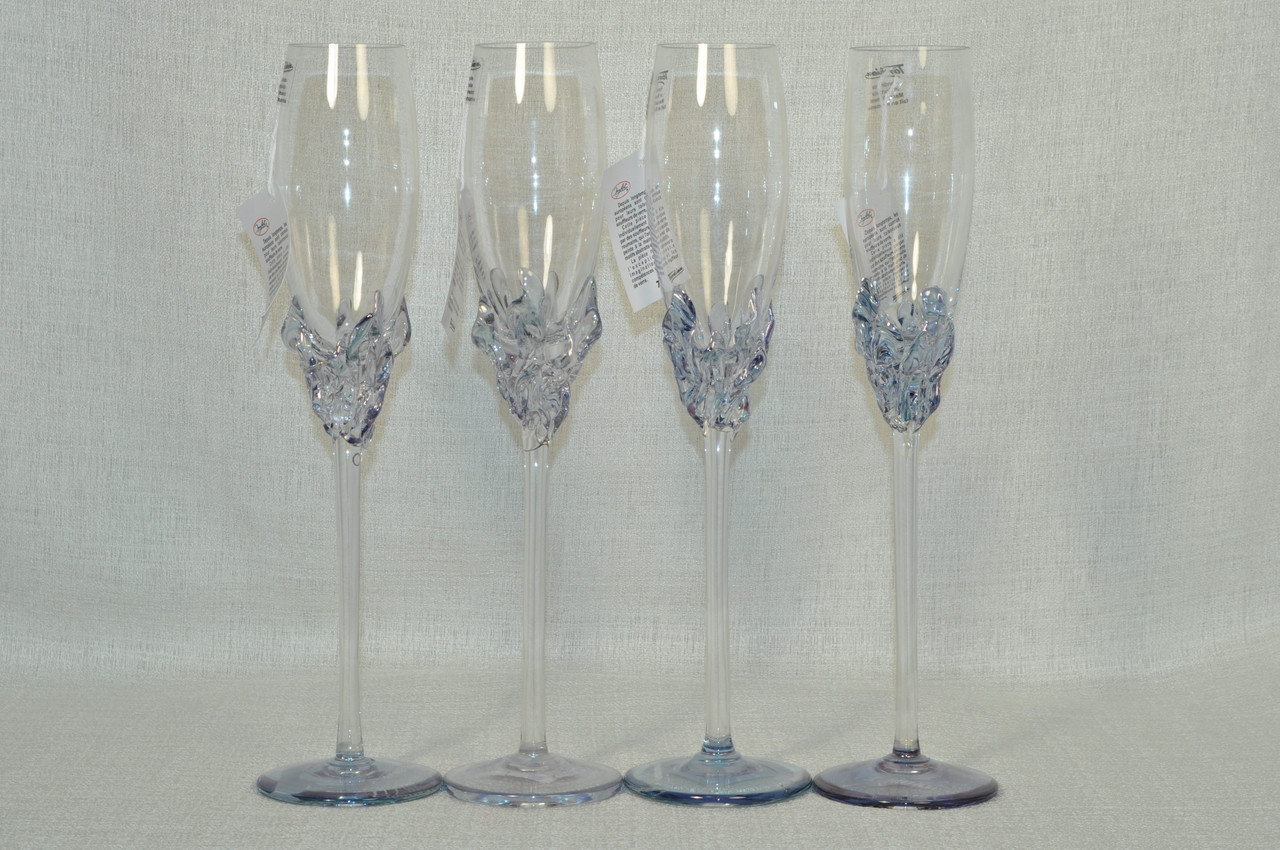 A gorgeous set of champagne flutes hand made by world-renown Art Glass artist Ion Tamaian