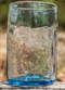 Turquoise hand blown drinking glasses made from recycled glass
