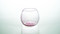 Fuchsia handcrafted stemless wine glass made from recycled glass