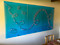The blue sky and butterfly swirls make for a beautiful and unique addition to any room. The piece measures 4' x 8.2' and is made of high-quality silk and plexiglass materials. 
