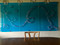 The blue sky and butterfly swirls make for a beautiful and unique addition to any room. The piece measures 4' x 8.2' and is made of high-quality silk and plexiglass materials. 