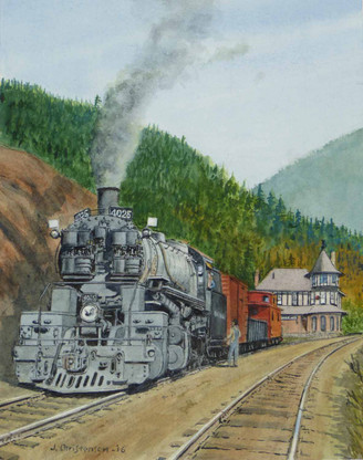 NP 4025, a Z-3 class 2-8-8-2 compound, pauses westbound with a two-car consist near the Wallace, Idaho depot on May 30, 1951. On its return to Missoula, Montana, 4025 will be limited to hauling only 600 tons by the 4 percent grades of Lookout Pass.