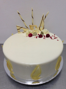 Elegant White Chocolate and Raspberry Mud Cake