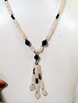 141 ct Faceted  Rose quartz with Garnet and silver beads with tassel necklace