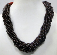 750 kt Garnet beads twisted multiple strands necklace