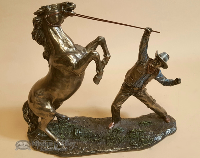 bronze rustic western statue