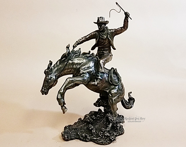 bronze rustic western statue