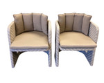 Set of two Cove chairs with cushions, former showroom floor sample.  Very good condition. Discontinued product - TAG 342