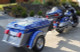 Blue  Legend Pull Behind Trailer Hauled by Motorcycle