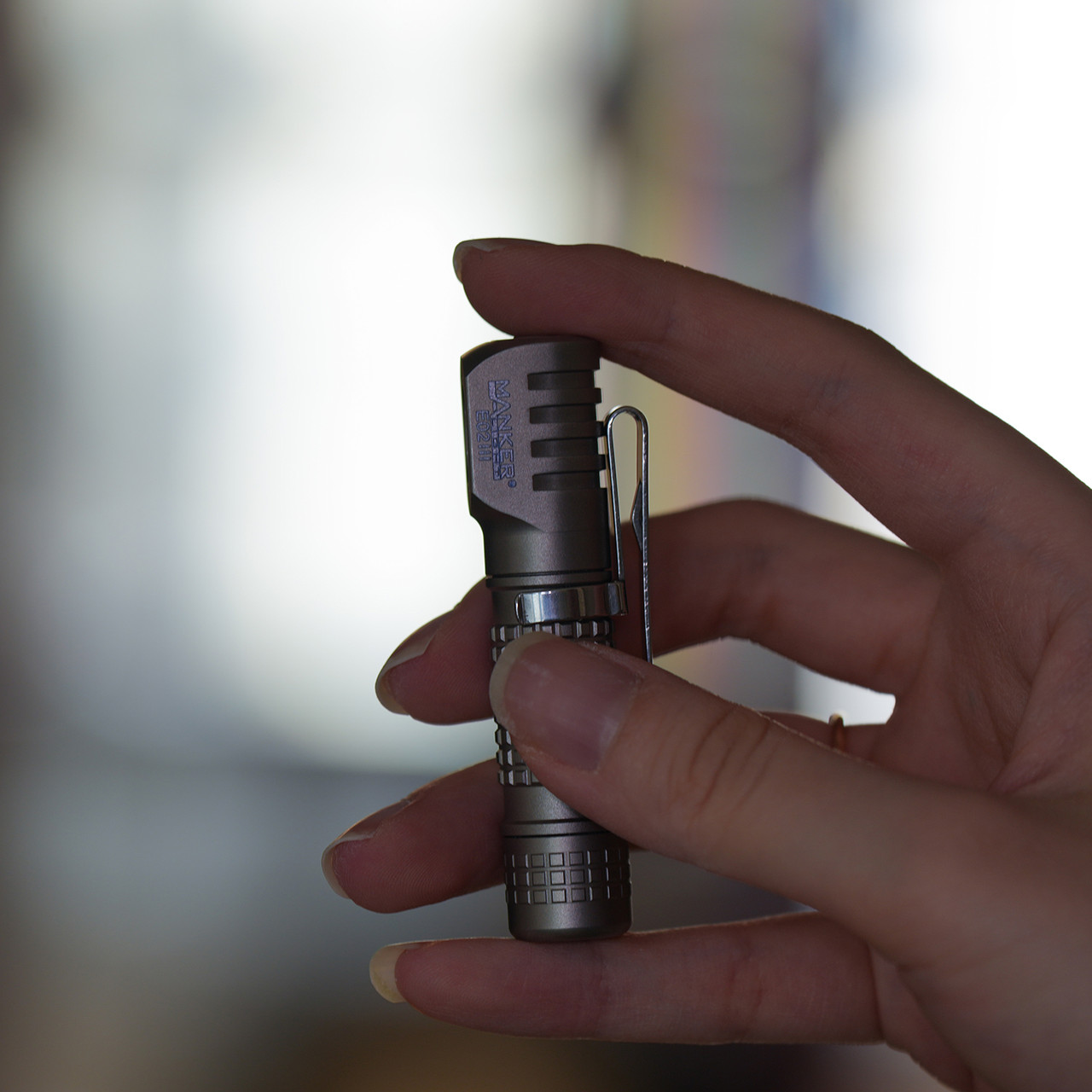 E02 III - Titanium - Small Flashlight - Mankerlight Official