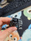 Forward 'clicky' button with silicone button-cap