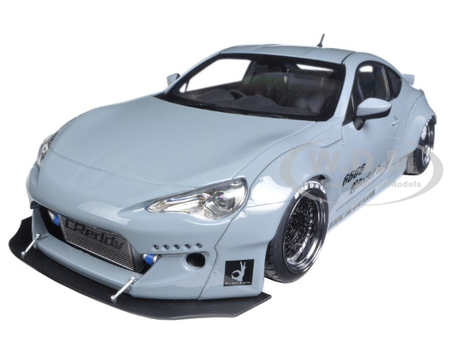 Toyota 86 Rocket Bunny RHD (Right Hand Drive) Concrete Gray with Graphics  and Black Wheels 1/18 Model Car by Autoart