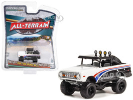1969 Ford Bronco Baja Black and White with Stripes BFGoodrich All Terrain Series 13 1/64 Diecast Model Car Greenlight 35230A