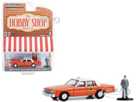 1981 Chevrolet Impala Capitol Cab Taxi Orange with White Top and Man in Suit Figure The Hobby Shop Series 15 1/64 Diecast Model Car Greenlight 97150B