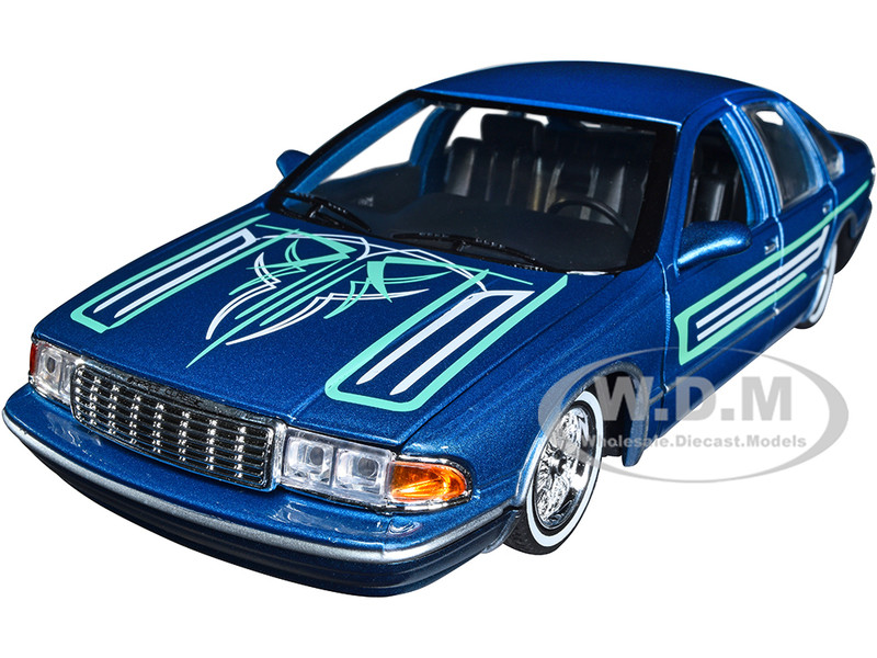 1993 CHEVROLET CAPRICE LOWRIDER BLUE GET LOW 1/24 DIECAST CAR