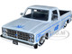 1985 Chevrolet C10 Pickup Truck Lowrider White Metallic Blue Graphics Street Low Series 1/24 Diecast Model Car Jada 34313
