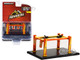 Adjustable Four-Post Lift ArmorAll Orange Yellow Four-Post Lifts Series 4 1/64 Diecast Model Greenlight 16150A