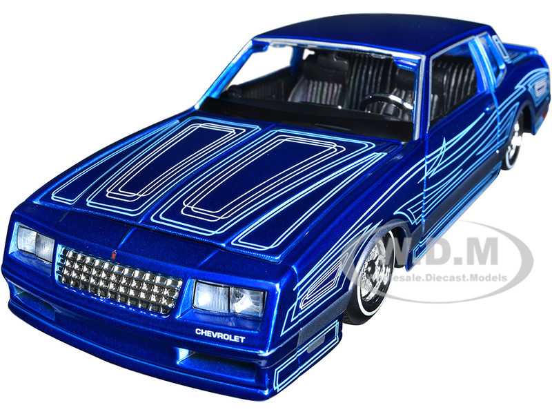 1986 Chevrolet Monte Carlo SS Lowrider Candy Blue Graphics Lowriders Series 1/24 Diecast Model Car Maisto 32542BL