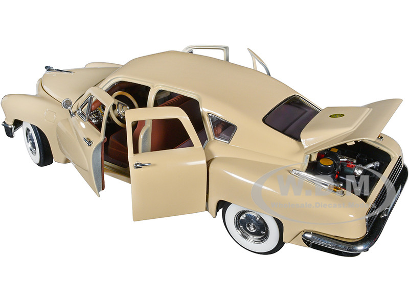 1948 TUCKER TORPEDO CREAM 1/18 DIECAST MODEL BY ROAD