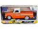 1966 Chevrolet C10 Fleetside Pickup Truck Lowrider Orange Metallic with White Top Get Low Series 1/24 Diecast Model Car Motormax 79034COP