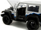 2007 Jeep Wrangler Gray and Black with Blue and White Stripes with Extra Wheels Just Trucks Series 1/24 Diecast Model Car Jada 34194