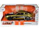 2010 Ford Mustang GT Gold Metallic with Black Graphics and Hood Tom s Racing Bigtime Muscle Series 1/24 Diecast Model Car Jada 33055