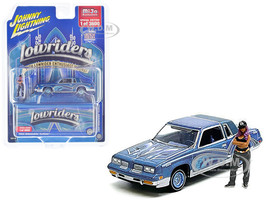 1984 Oldsmobile Cutlass Lowrider Blue Metallic with Graphics and Blue Interior and Diecast Figure Limited Edition to 3600 pieces Worldwide 1/64 Diecast Model Car Johnny Lightning JLCP7461