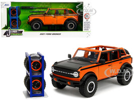 2021 Ford Bronco Open Top Orange with Black Stripes and Hood with Extra Wheels Just Trucks Series 1/24 Diecast Model Car Jada 34189