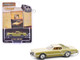 1976 Ford Thunderbird Gold Metallic and Cream Treat Yourself to One of the World s Great Luxury Car Buys Vintage Ad Cars Series 11 1/64 Diecast Model Car Greenlight 39150E