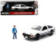 Toyota Trueno AE86 RHD Right Hand Drive White and Black with Graphics and Takumi Diecast Figure Initial D 1998 2021 TV Series Anime Hollywood Rides Series 1/24 Diecast Model Jada 34501