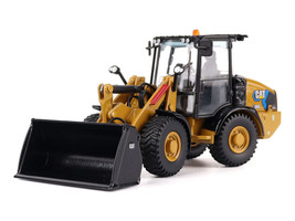 CAT Caterpillar 906 Electric Compact Wheel Loader Yellow with Operator High Line Series 1/50 Diecast Model Diecast Masters 85772