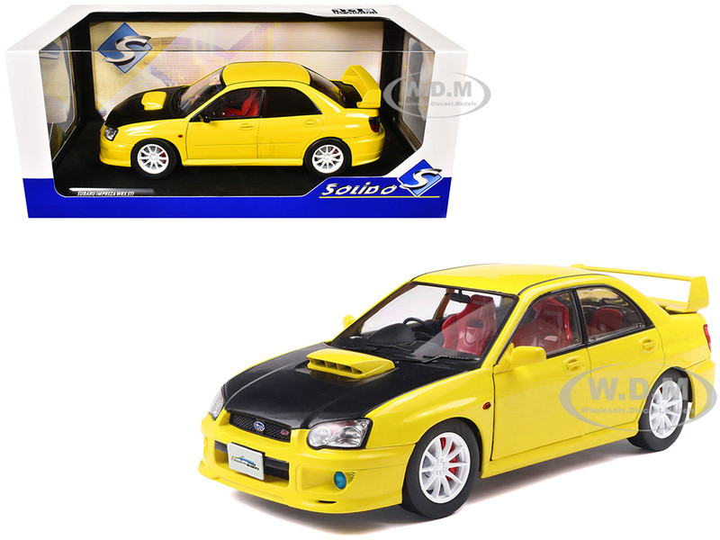 2003 Subaru Impreza WRX STI RHD (Right Hand Drive) Yellow with Carbon Hood 1/18 Diecast Model Car by Solido S1812302