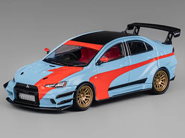 Mitsubishi Lancer Evolution X Varis RHD Right Hand Drive Light Blue with Black Top and Orange Stripes 1/64 Diecast Model Car CM Model CM64-EVOX-01