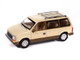 1987 Plymouth Voyager Van Light Cream and Golden Bronze Metallic 2 Tone Mighty Minivans Series 1/64 Diecast Model Car Auto World 64512-AWSP197B