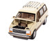 1987 Plymouth Voyager Van Light Cream and Golden Bronze Metallic 2 Tone Mighty Minivans Series 1/64 Diecast Model Car Auto World 64512-AWSP197B 1987 Plymouth Voyager Van Light Cream and Golden Bronze Metallic 2 Tone Mighty Minivans Series 1/64 Diecast Model Car Auto World 64512-AWSP197B