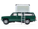 1990 Chevrolet Suburban Green with Modern Rooftop Camper The Great Outdoors Series 4 1/64 Diecast Model Car Greenlight 38080E