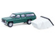 1990 Chevrolet Suburban Green with Modern Rooftop Camper The Great Outdoors Series 4 1/64 Diecast Model Car Greenlight 38080E