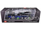 Peterbilt 389 Day Cab with Miller Century 1150 Rotator Wrecker Tow Truck Black with Blue and Green Graphics 1/64 Diecast Model DCP/First Gear 60-2248
