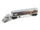 International Lonestar Truck with Sleeper Silver Metallic with CAT Caterpillar Mural Trailer Transport Series 1/50 Diecast Model by Diecast Masters 85769